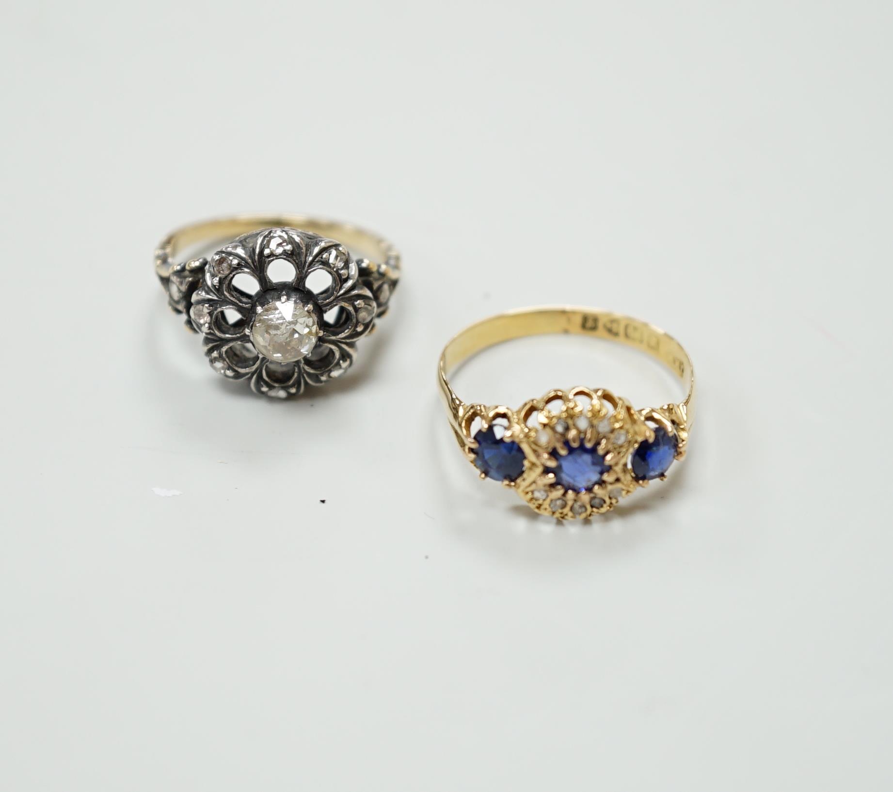 An 18ct gold sapphire and diamond dress ring, size R, gross 2.8 grams and a 19th century rose diamond set ring, size L, gross 5.5 grams